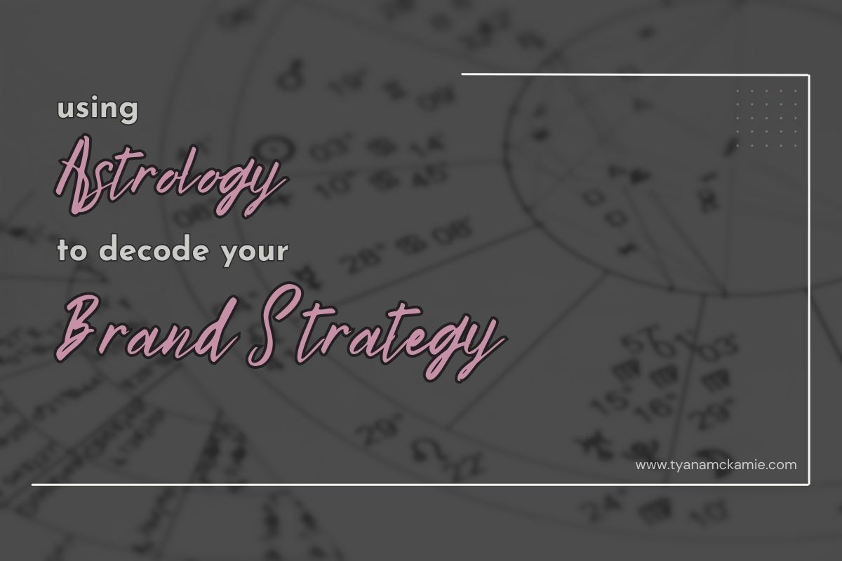 Dark gray graphic background of an astrology birth chart wheel with soft pink and white text overlay that reads: 'using Astrology to decode your Brand Strategy'. The words 'Astrology' and 'Brand Strategy' are in a handwritten script style, while the rest is in a clean sans-serif font. Framed with minimalist white lines and a dotted accent, with the website URL www.tyanamckamie.com in the bottom right corner.