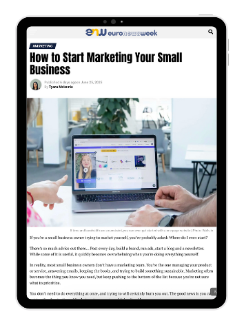 Tablet screen displaying the Euronewsweek article “How to Start Marketing Your Small Business” by Tyana McKamie, with a person viewing a website on a laptop.